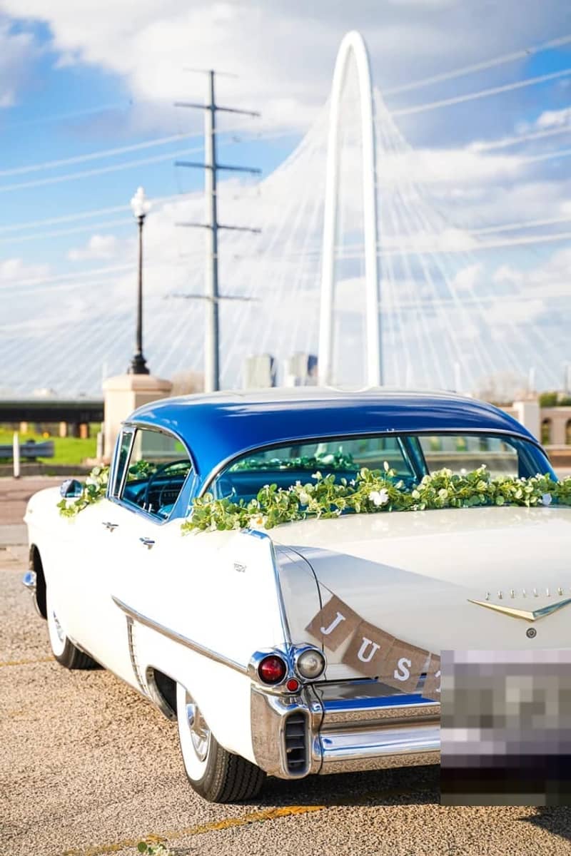 1957 Cadillac Sedan DeVille — white and blue 1957 Cadillac Sedan DeVille classic car