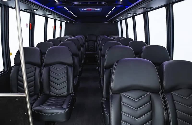 Executive Shuttle & Charter Coach — executive shuttle coach interior with forward facing seats