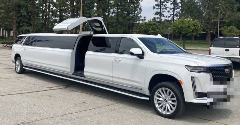 Cadillac Escalade Stretch — white Cadillac Escalade stretch limousine
