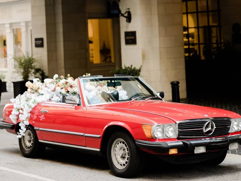 Mercedes-Benz 450SL Cabriolet — red classic Mercedes-Benz 450SL convertible wedding car in downtown Dallas