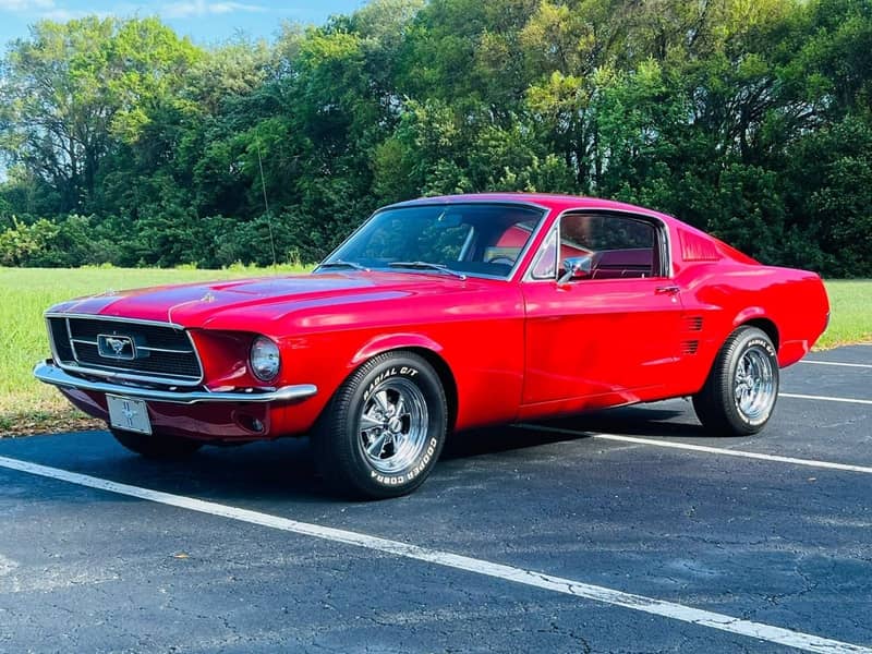 1967 Ford Mustang — red 1967 Ford Mustang fastback classic car